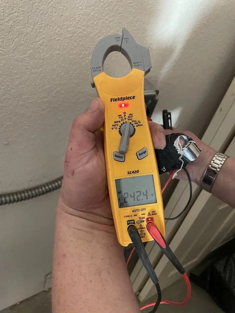 Voltage testing with clamp meter during Recessed Lighting Installation in Tracyton
